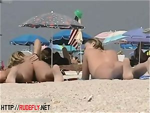 platinum-blonde model nudist on the naked beach spycam flick